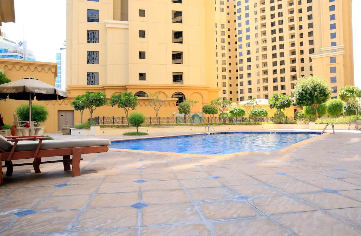 1BR Apartment with Pool & Gym in Dubai - Image 18
