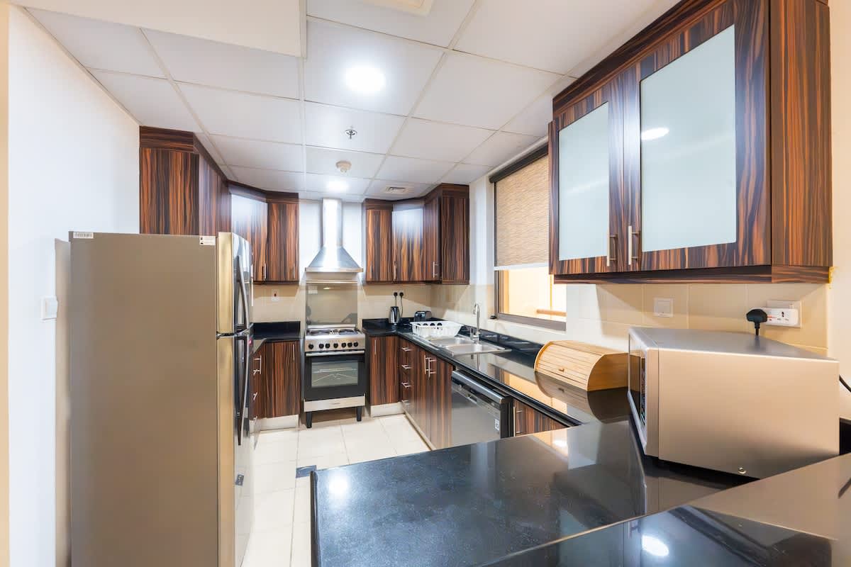 1BR Apartment with Pool & Gym in Dubai - Image 13