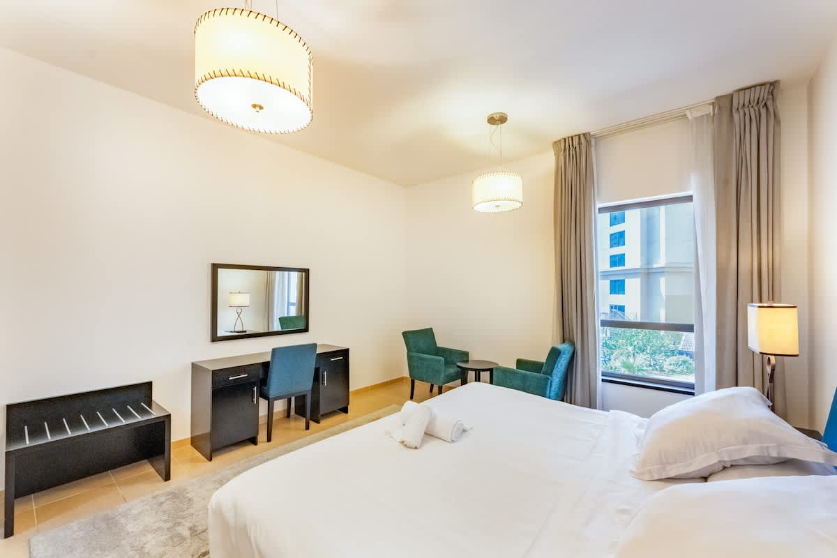 1BR Apartment with Pool & Gym in Dubai - Image 9