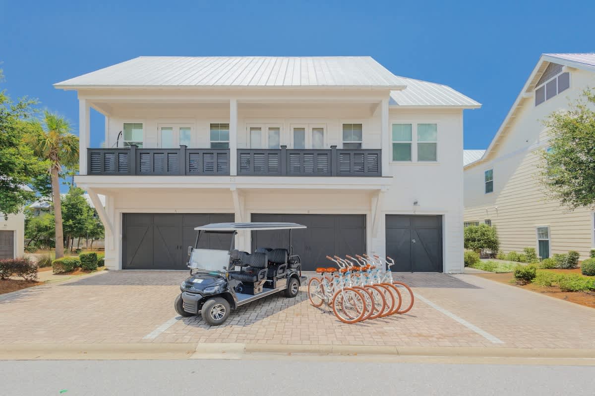 Home features a 6-seater golf cart and 6 adult bikes!