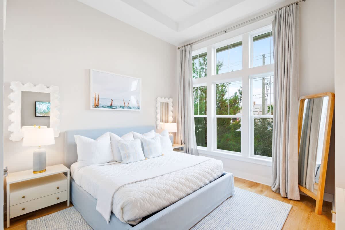 Bedroom #3 features a king bed, ensuite and smart tv.