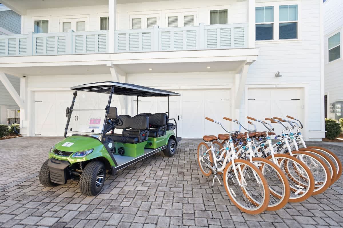 Home comes with 6-seater golf cart and six adult bikes!
