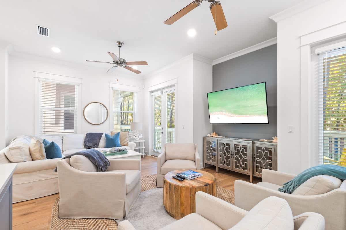 Living features a smart tv and two walkouts to your private patio.