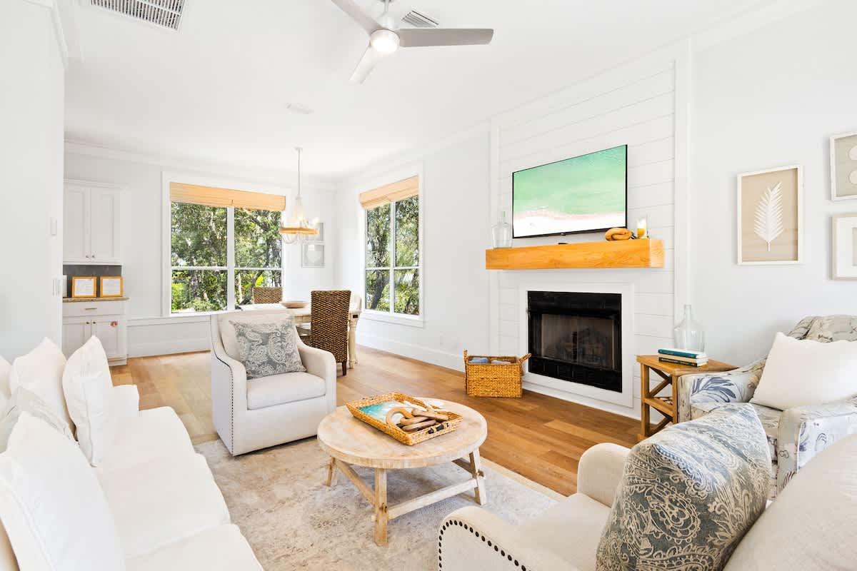 Home features a reverse floor plan, with living, dining, and kitchen on the second floor.