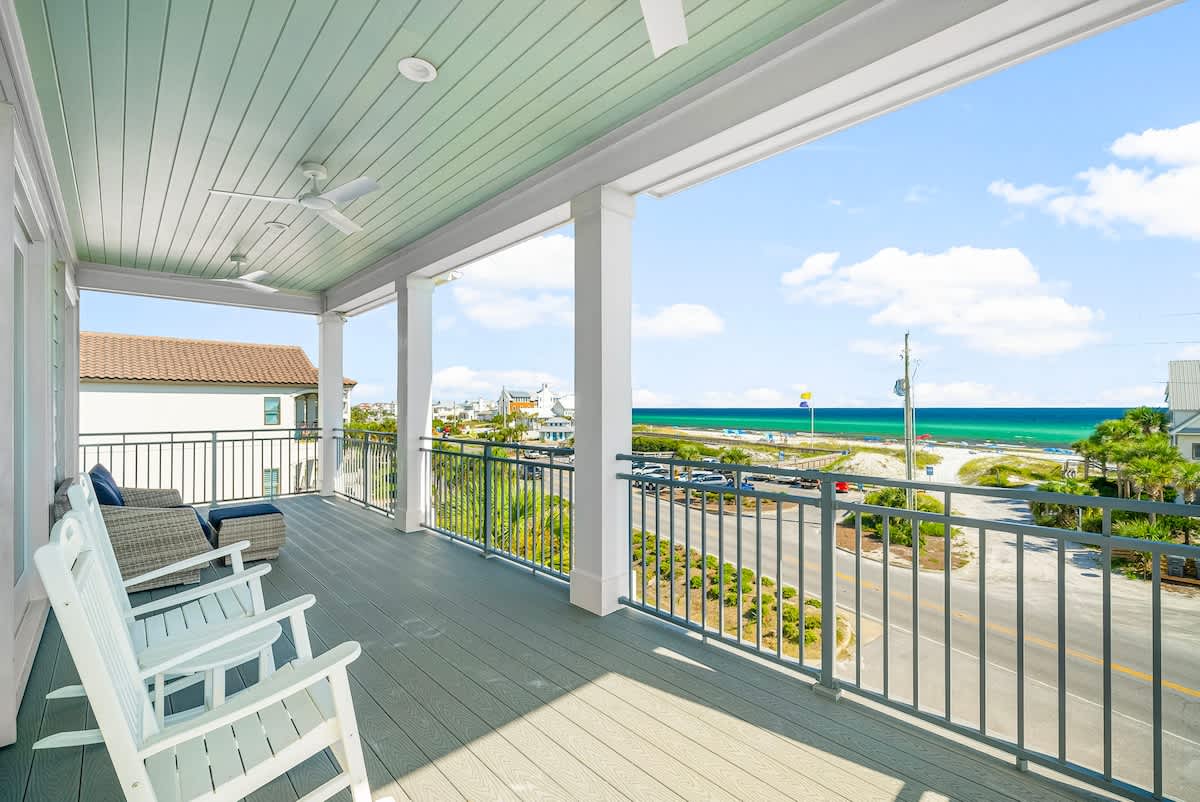 Large covered porch off of bedrooms #5 and #6, perfect for morning coffee & relaxation while enjoying gulf views.