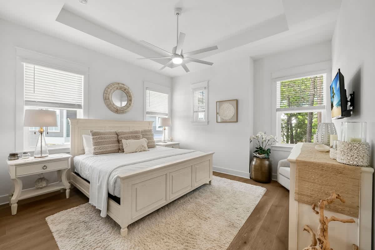 Bedroom #3 features a king bed, ensuite, and smart tv.