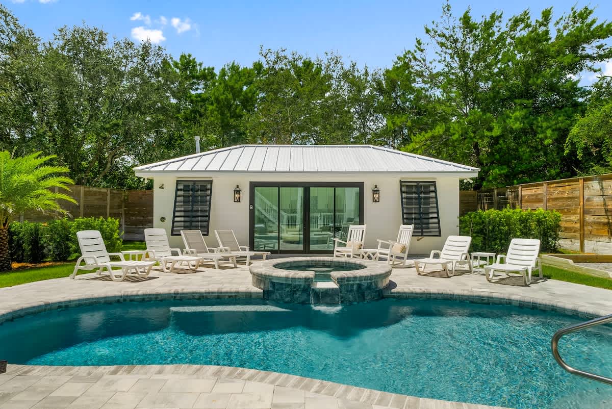 Pool house with direct access to outdoor lounging.