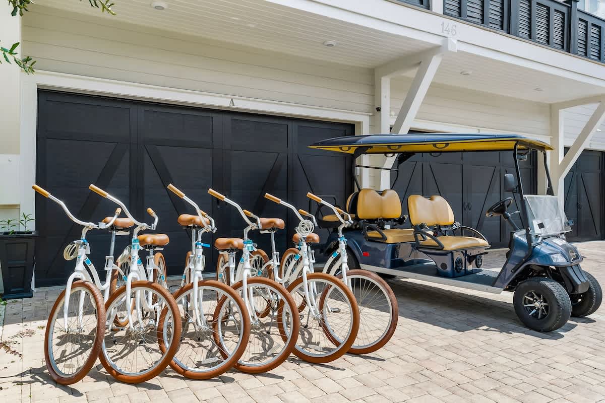 Home comes with golf cart, 6 adult bikes, and beach gear essentials!