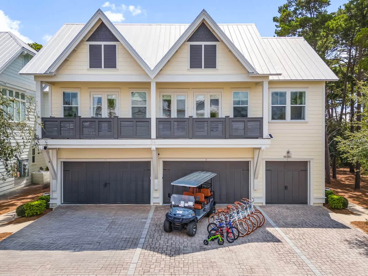 Home features a 6 seater golf cart, 6 adult bikes, and kid bikes!