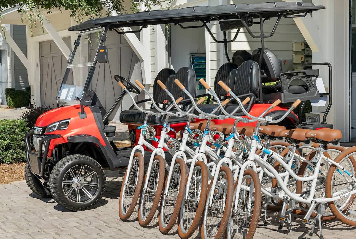 The home features a 6 seater golf cart & 6 adult bikes.