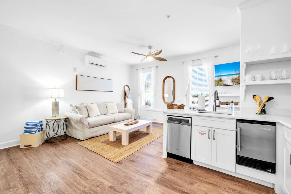 Condo features an open concept floor plan complete with a smart tv.