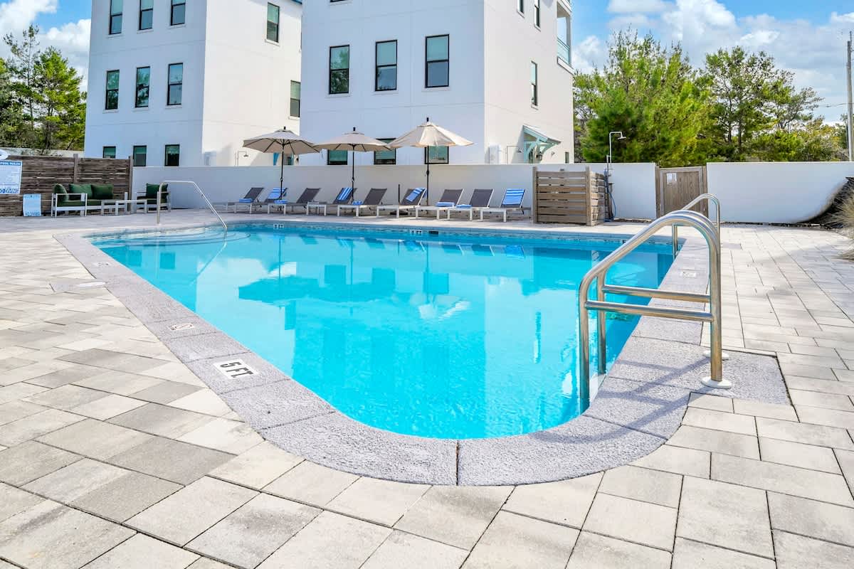 Community pool with lounge seating