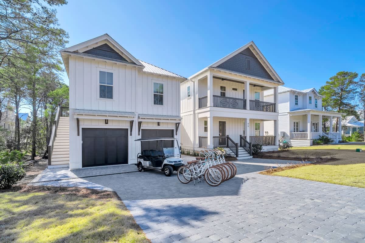 Home features a 6-seater golf cart and bikes.