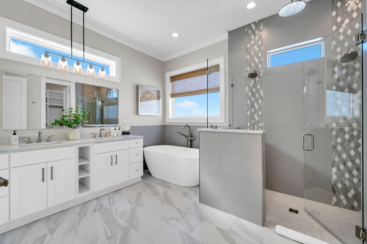 Primary bathroom features a soaking tub and walk-in shower