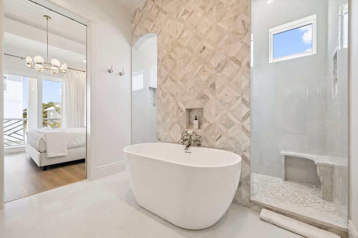 Master Bedroom features a soaking tub + walk-in shower ensuite