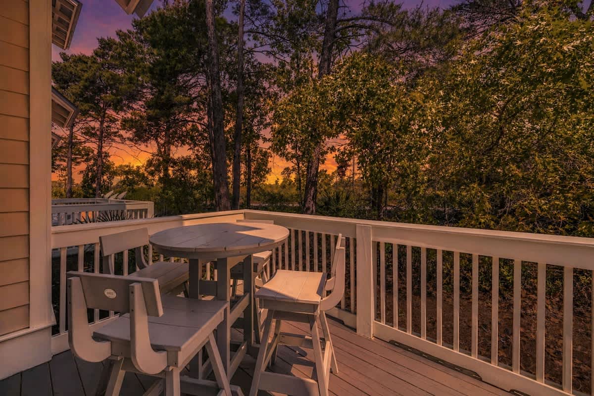 Large private patio with seating off living room