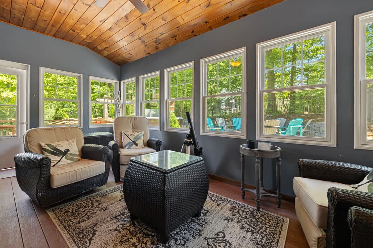 The three-season room is a wonderful spot to take morning coffee.