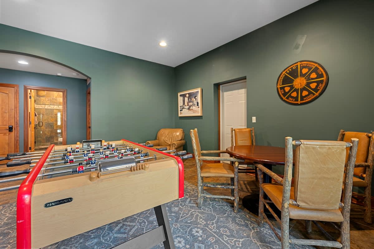 A game room with foosball table and other activities provides entertainment for everyone.