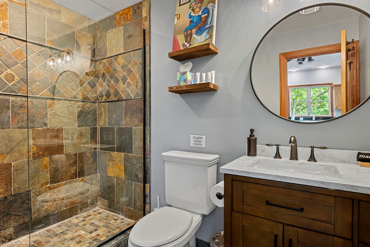 Complete luxury is all yours in the walk-in shower with double-rain heads.