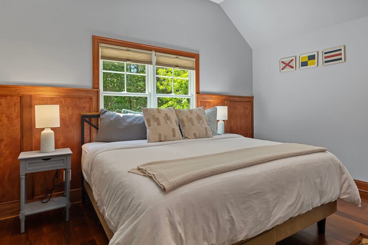 The main bedroom has everything needed for an evening retreat away from the others.