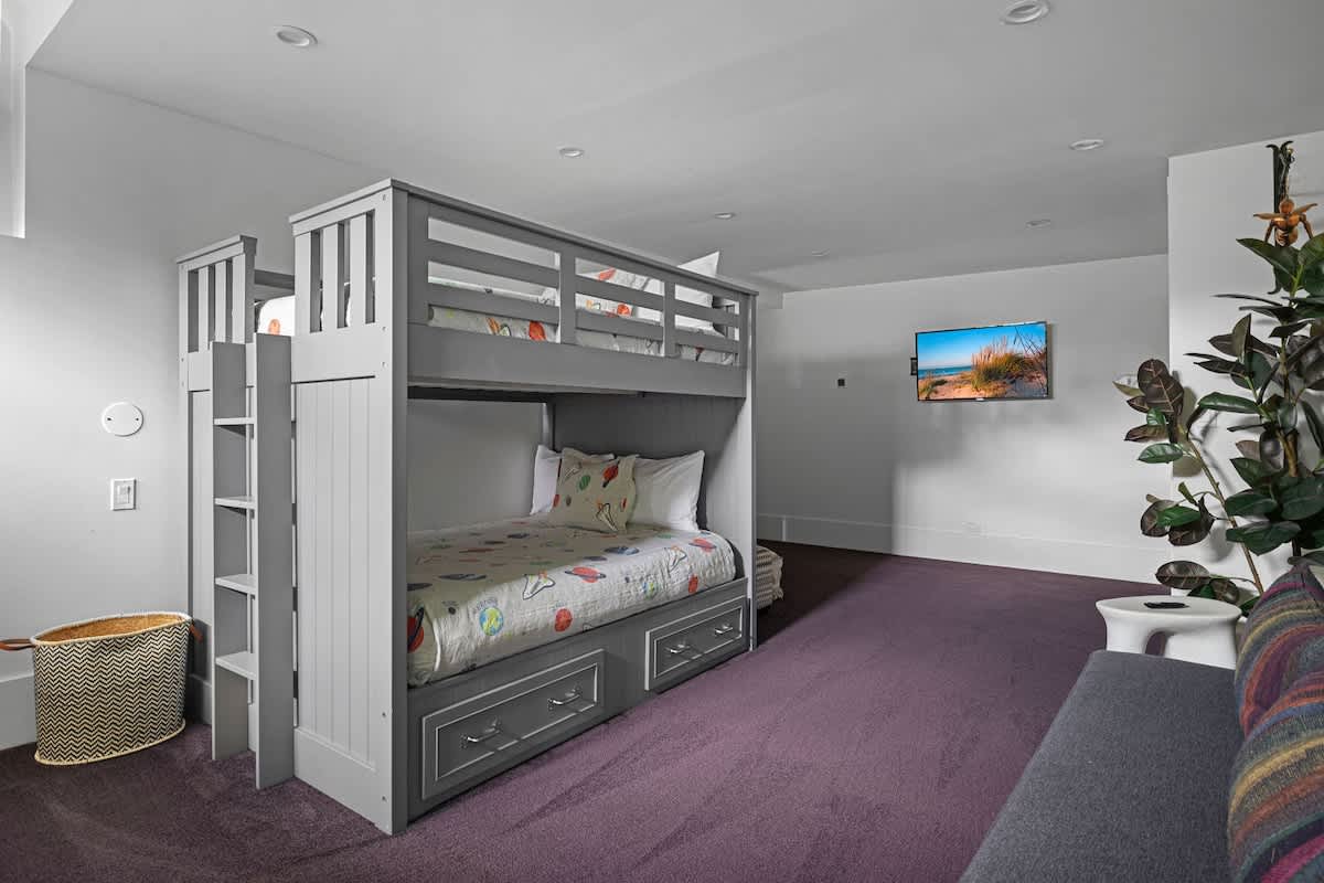 Bedroom 4 is on the upper level & has a full-size bunkbed.