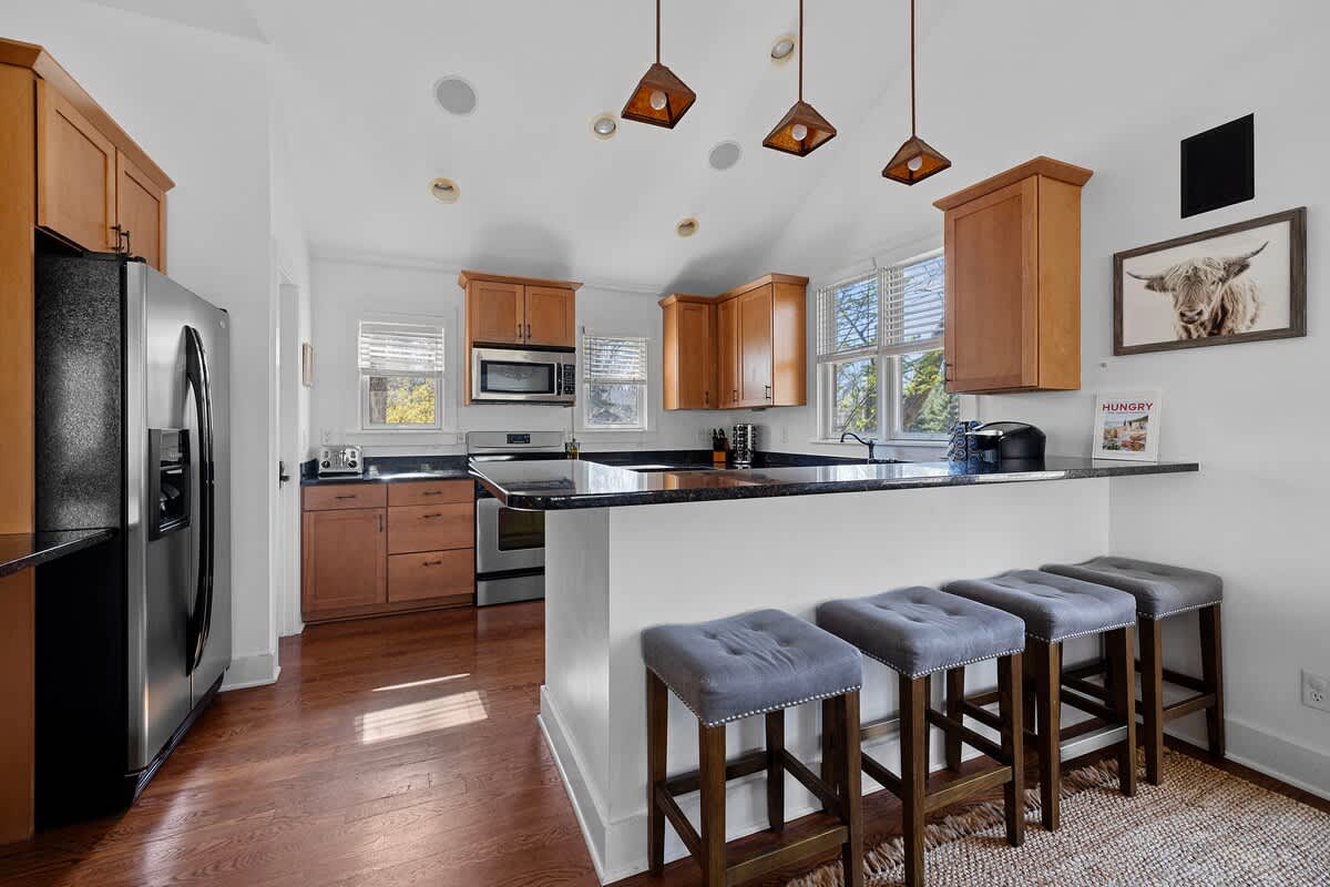 Wild Horse Run’s spacious, eat-in kitchen with high-end appliances is every chef’s dream.