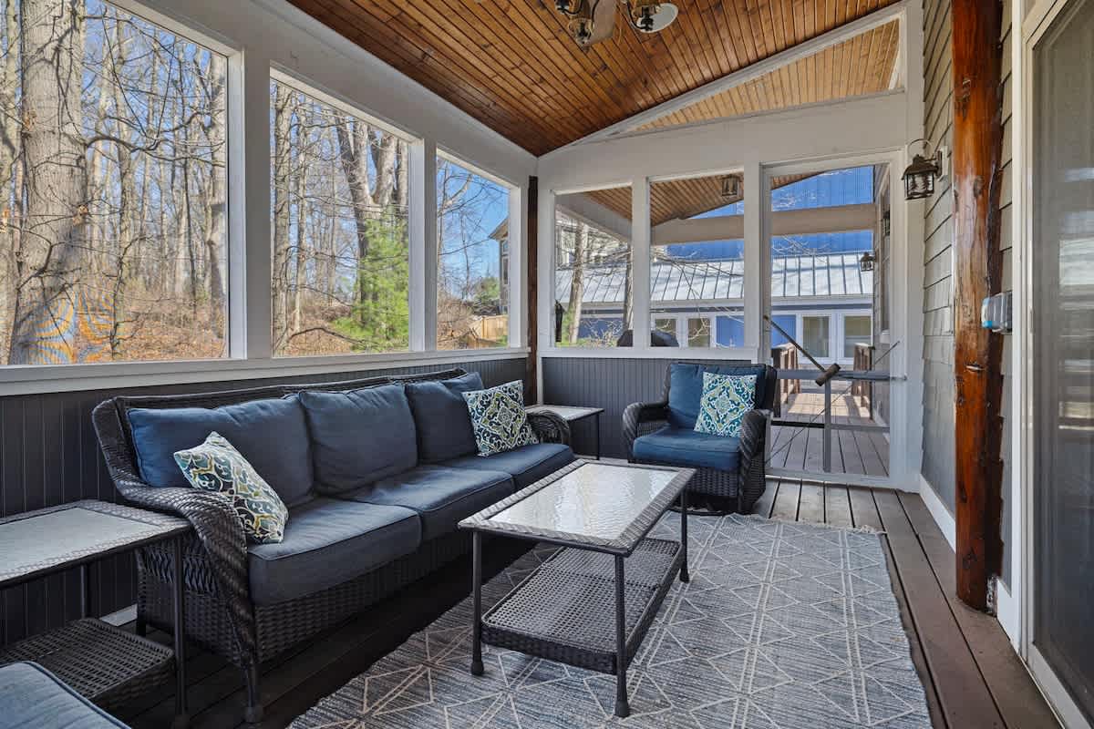 An amazing, enclosed patio off the main living space is ideal for four-season dining and entertainment.