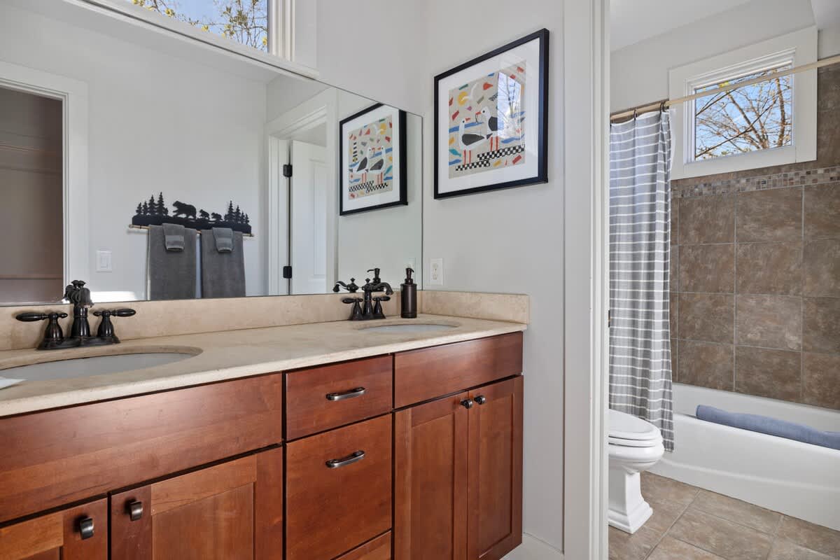 Having 2 twin-sink vanity bathrooms is wonderful during the morning rush.