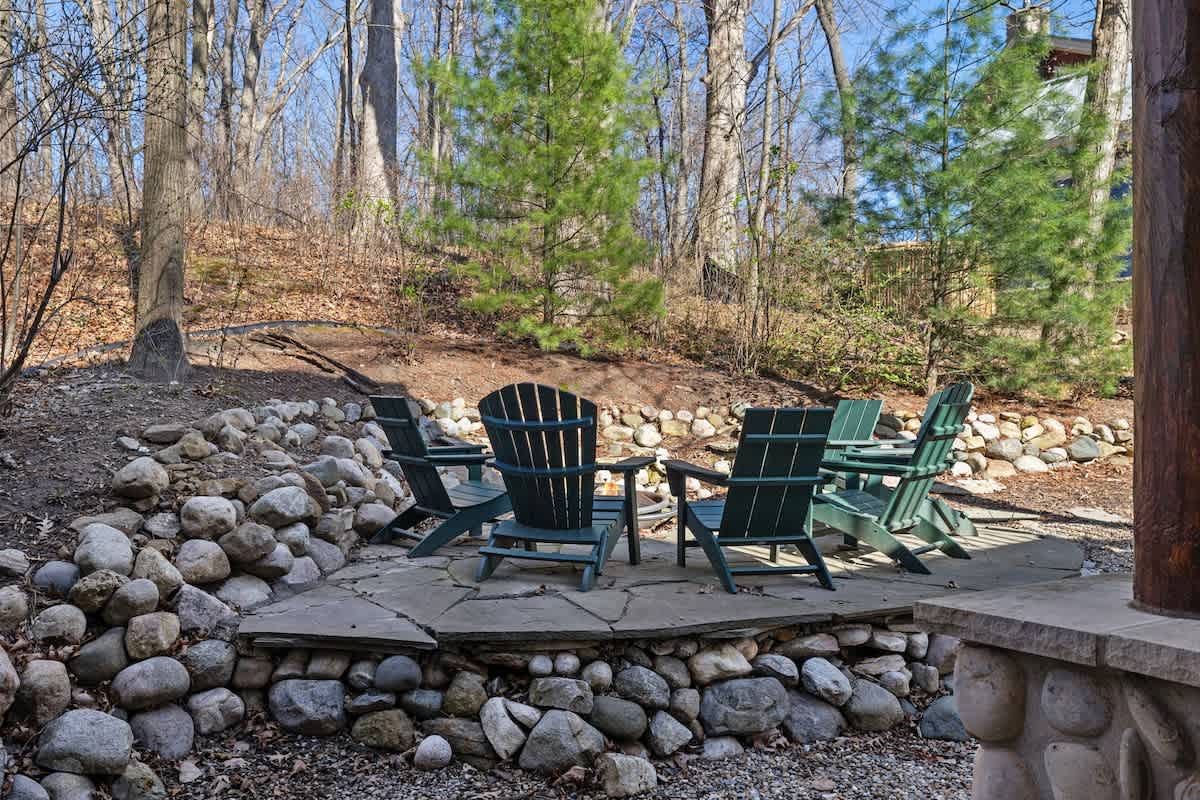 Extend the entertaining outdoors to the stone-surround firepit.