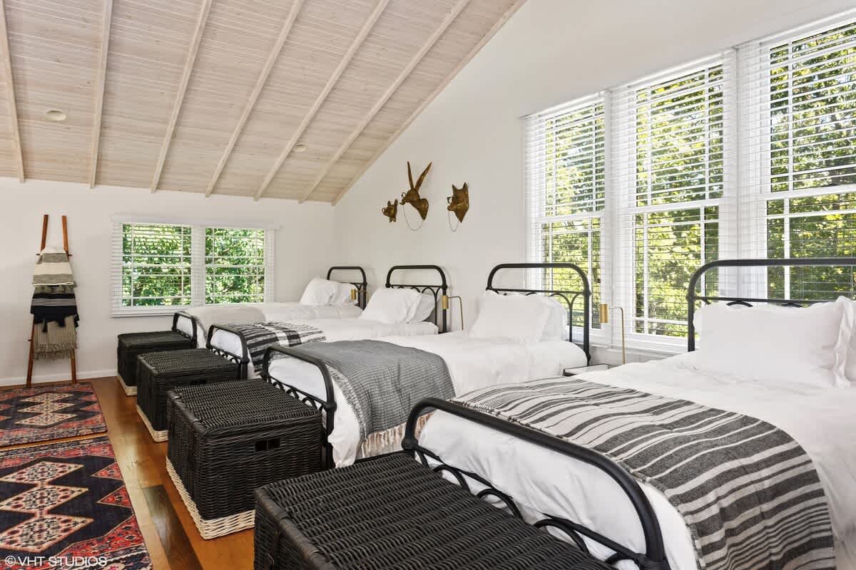 Bedroom 3 is on the upper level & has 4 twin-size beds.