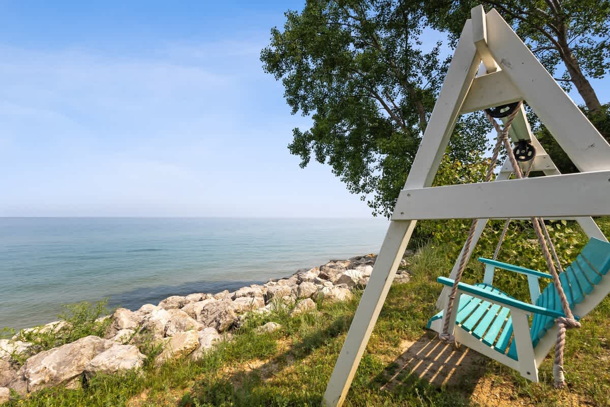 Sway by the shore and soak in the lakefront serenity.