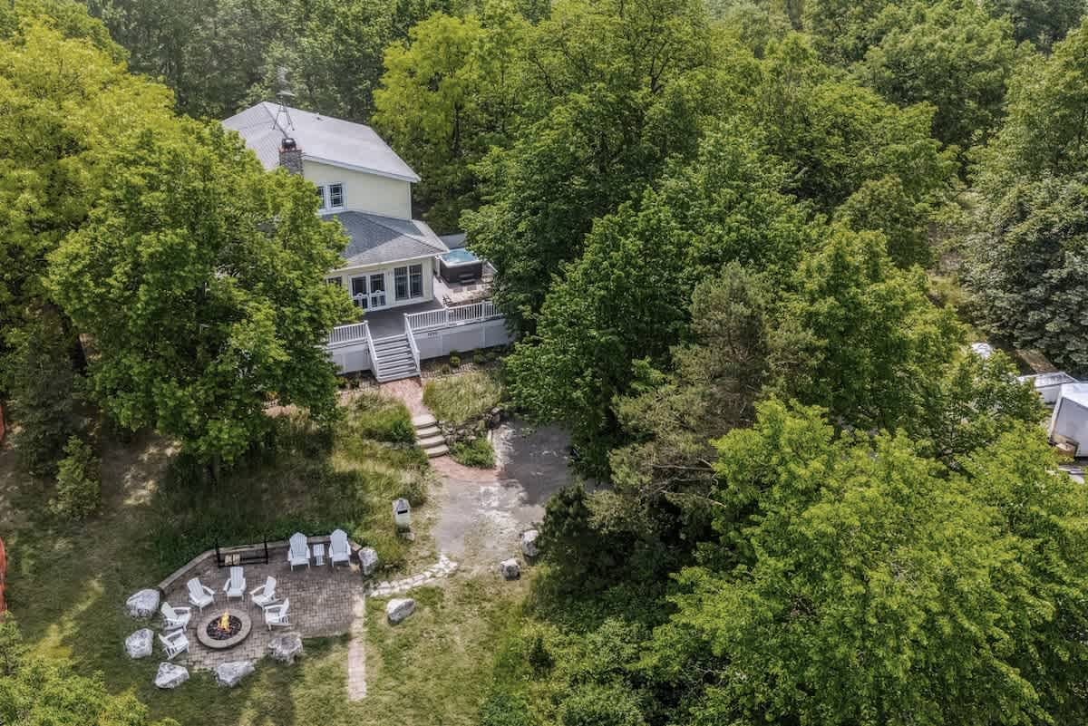 Your private paradise—deck, hot tub, and firepit included.