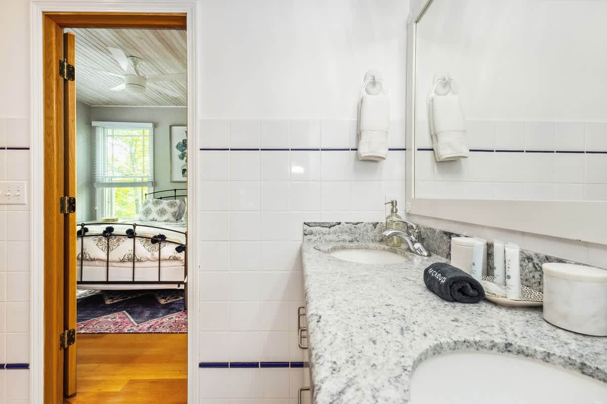 The main bedroom's en-suite bath offers privacy from the rest of the group.