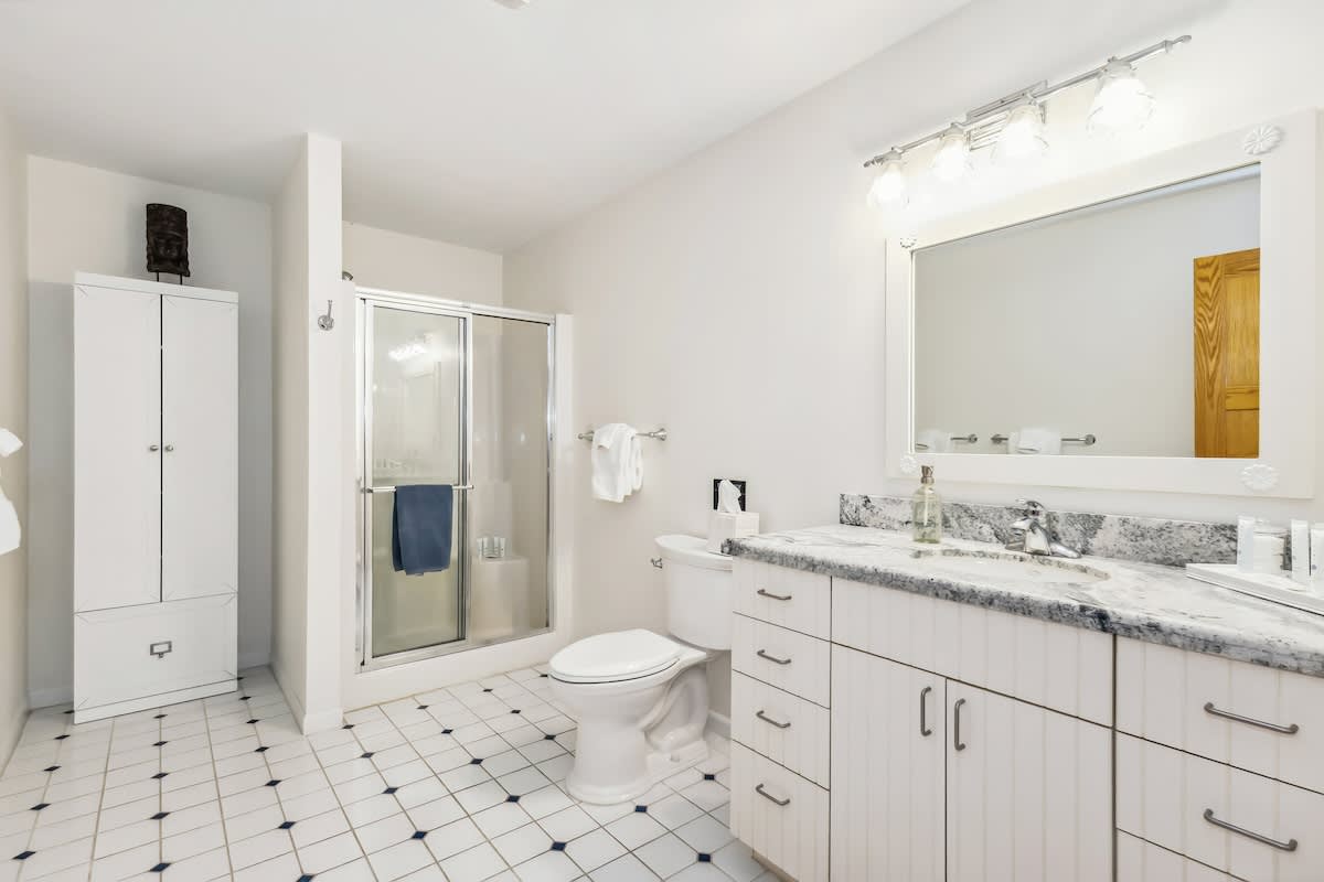 Unwind in this crisp, serene space after a day of adventure.