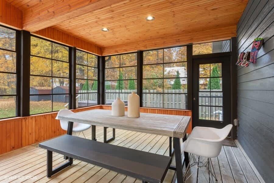 Picnic table-style dining on the porch is a great option for the 