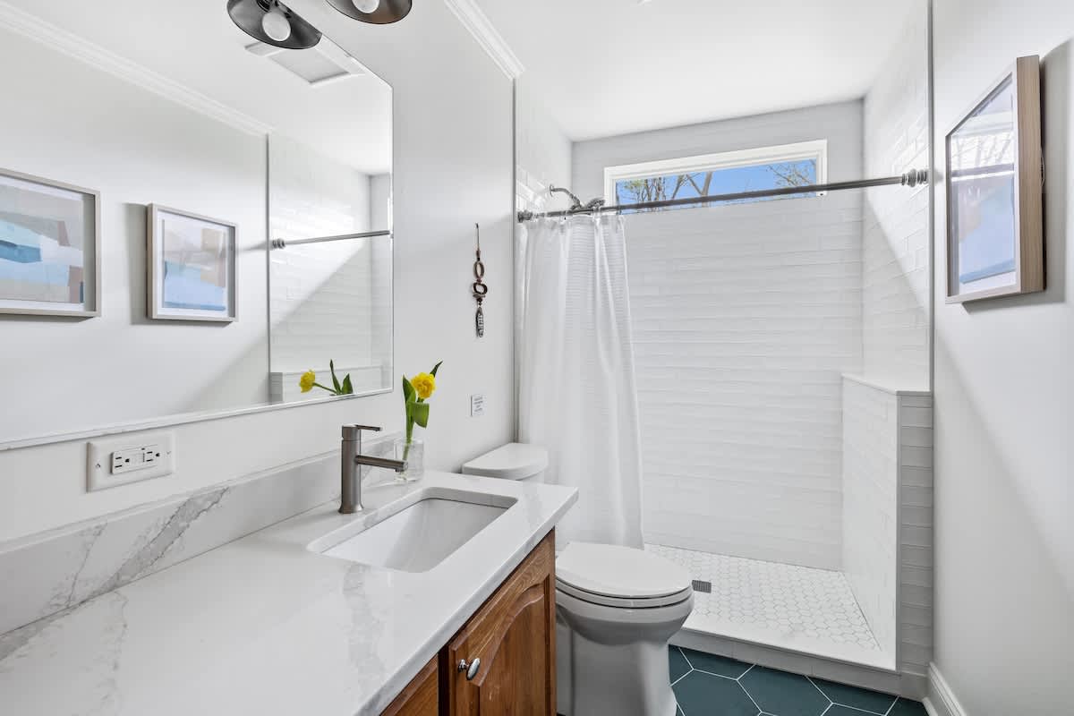 Refresh in the well-appointed bathroom, equipped with all the essentials.