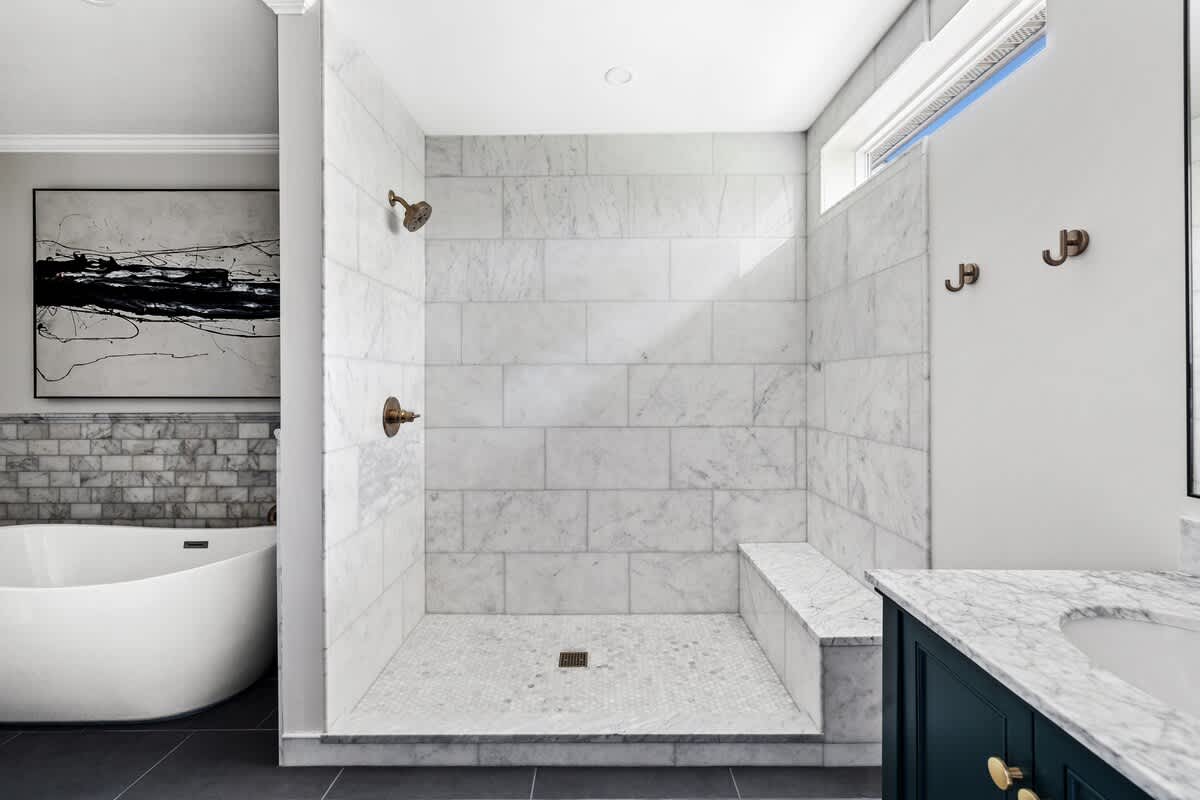 Escape to the ultimate oasis of relaxation in the primary ensuite bathroom.