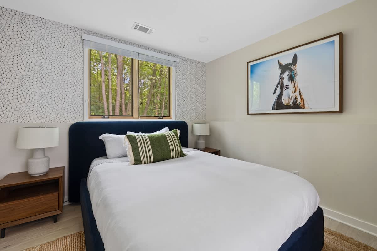 Bedroom 2 is on the lower level & has a queen-size bed.