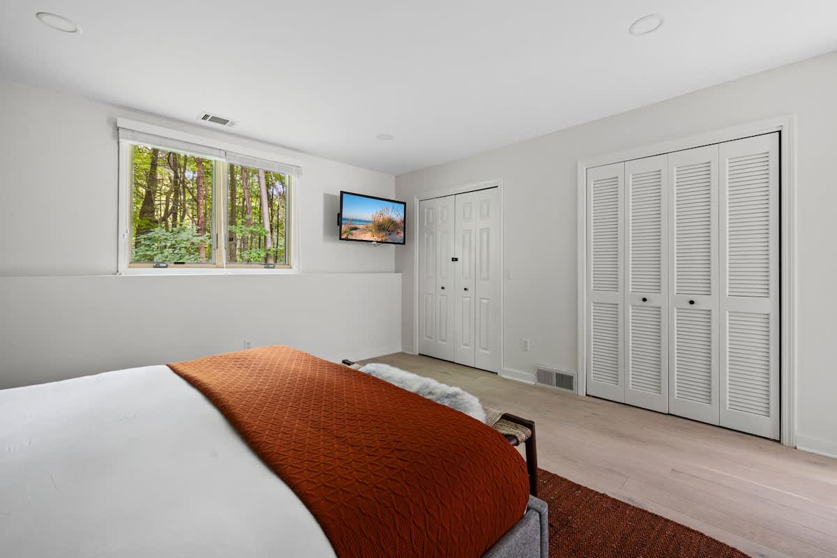 The main BR is spacious & has a Smart TV.