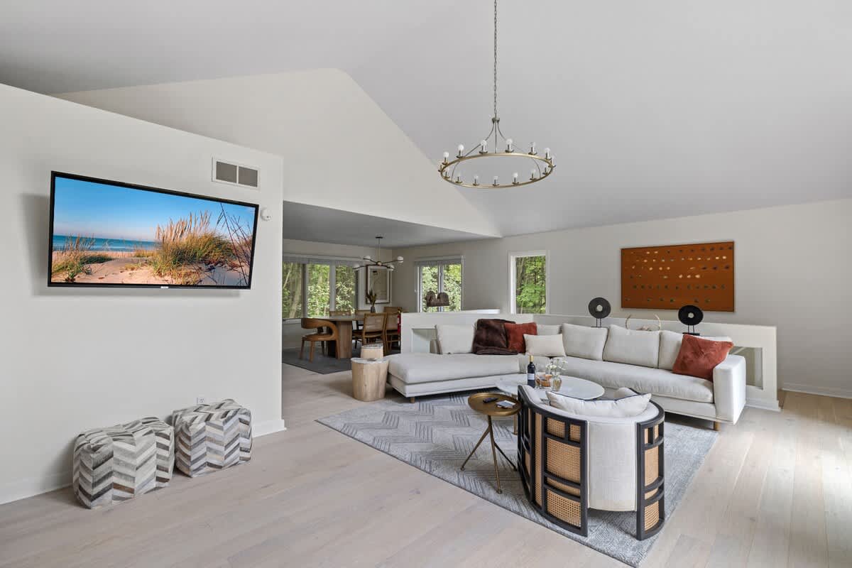 Our living room greets w/ an inviting atmosphere and warm décor.