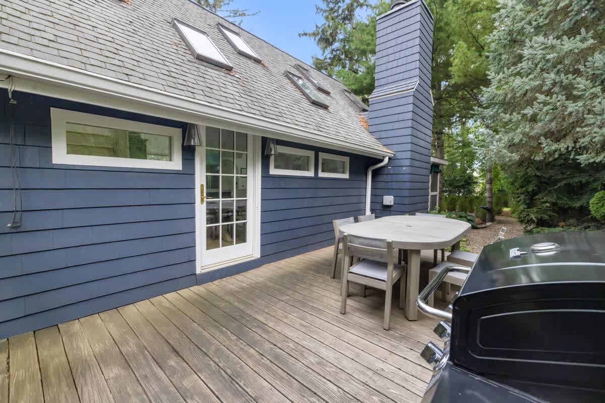 Enjoy meals together on the deck, steps from nature.