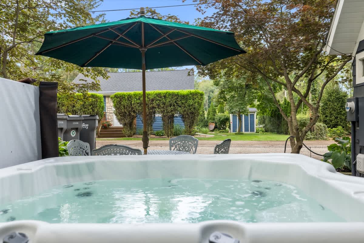 Soak beneath the shade—your private spa awaits.