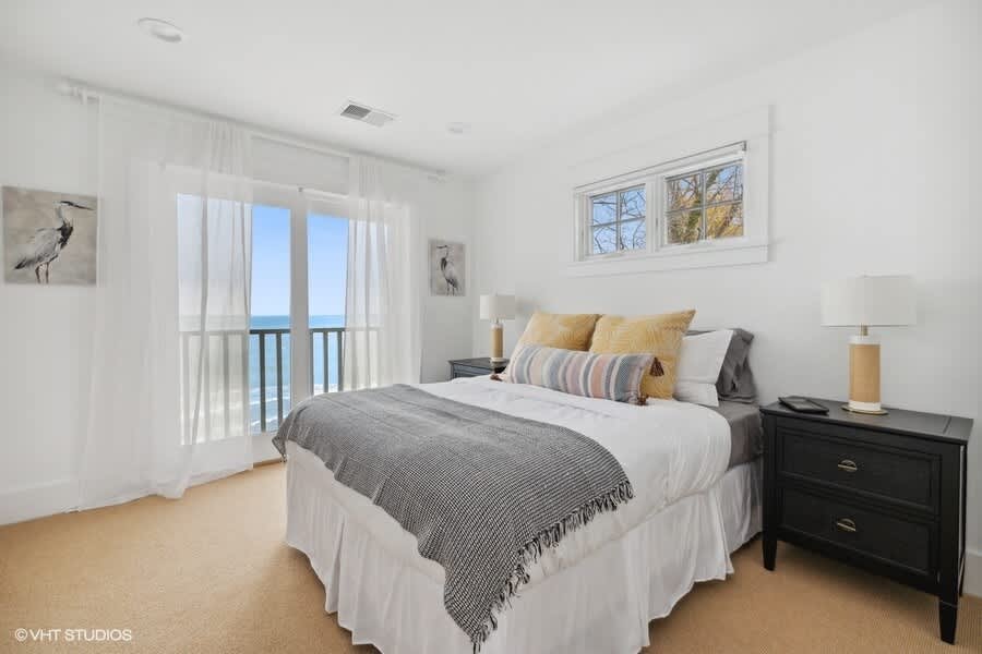 Bedroom 2 is on the upper level & has a queen-size bed.