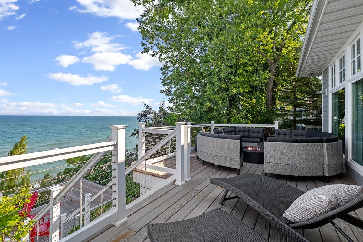 Enjoying the serene view of the ocean from this beautiful deck.