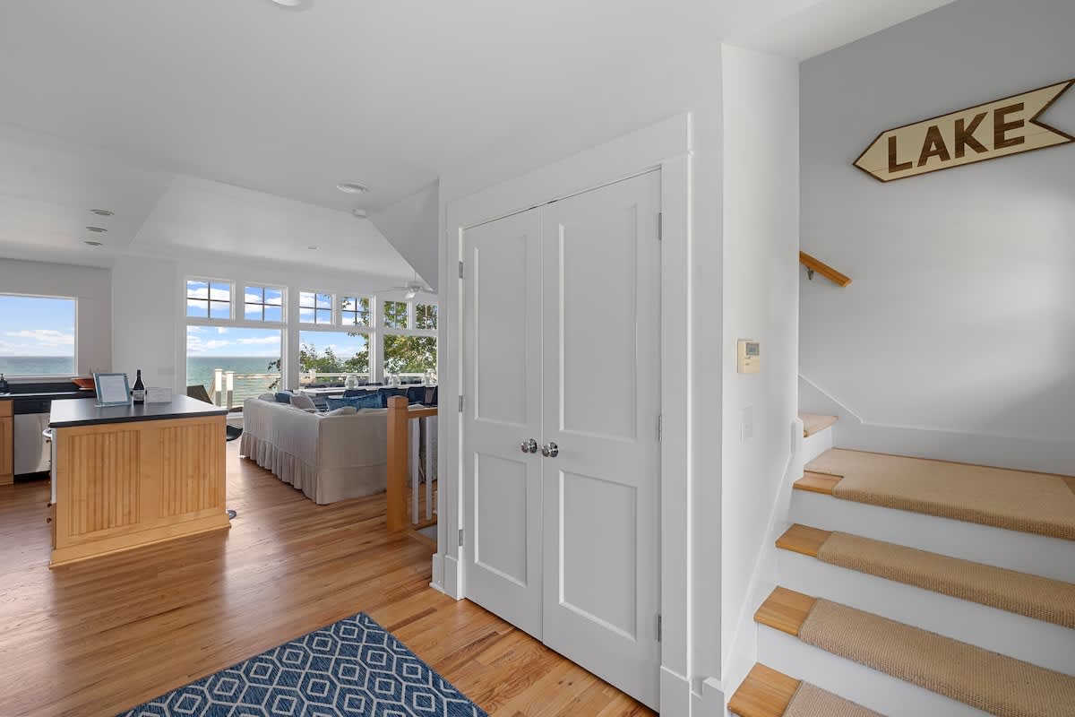 A true lakefront gem, this 3000 sqft home has the ideal floorplan for 12 guests.
