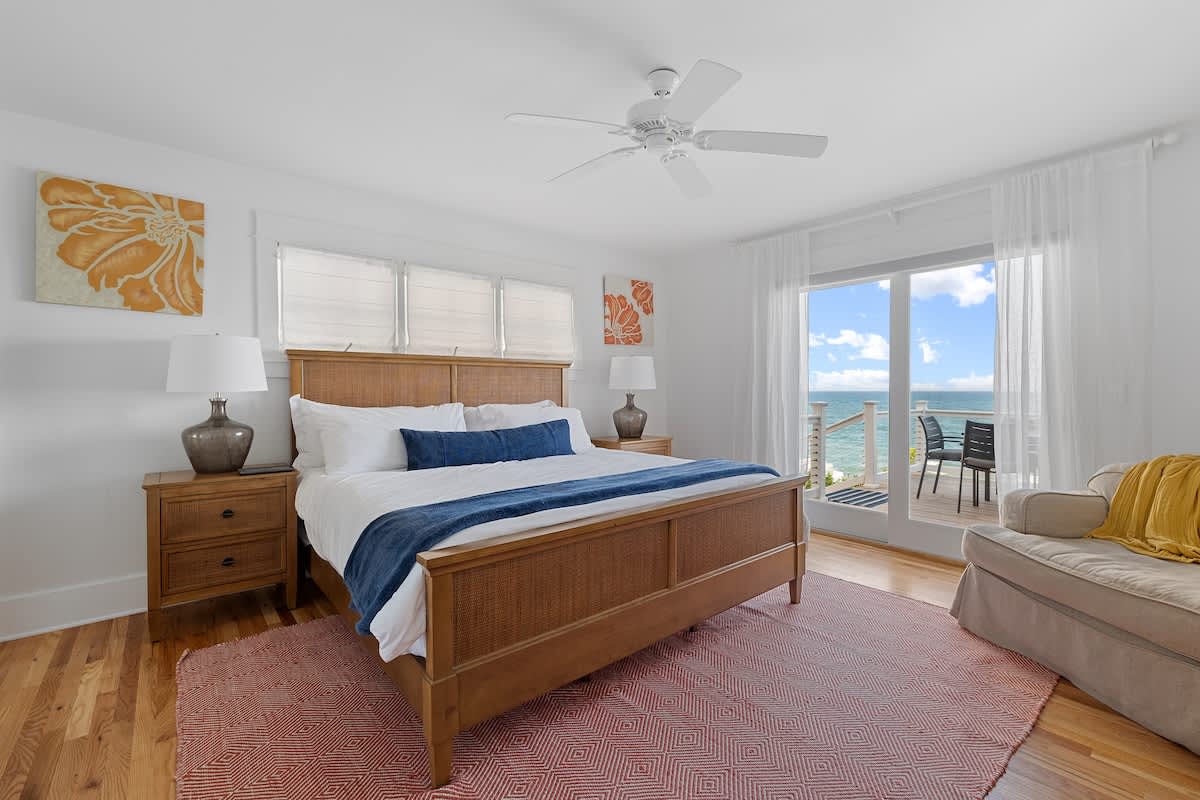 Primary bedroom is on the main level & has a king-size bed.