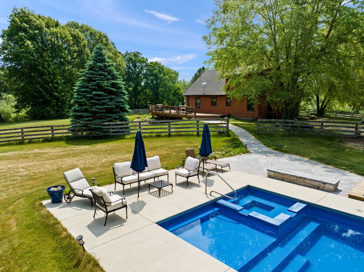Relax in our Jacuzzi while the kids play in the pool.