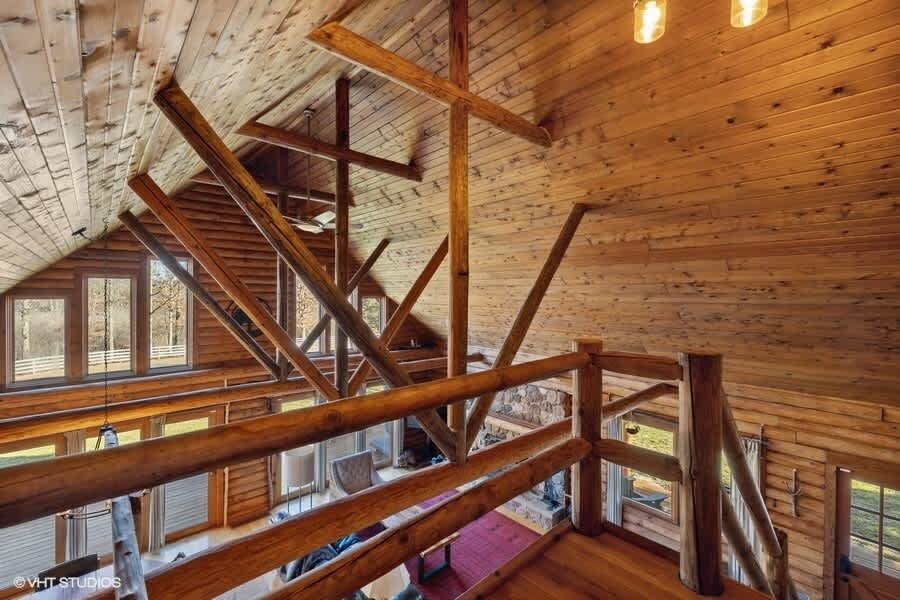 Enjoy every detail, from stunning wooden beams to rustic accents throughout this home.