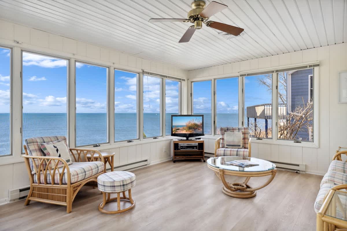 This cozy space offers the perfect spot to unwind and catch up on your favorite shows.