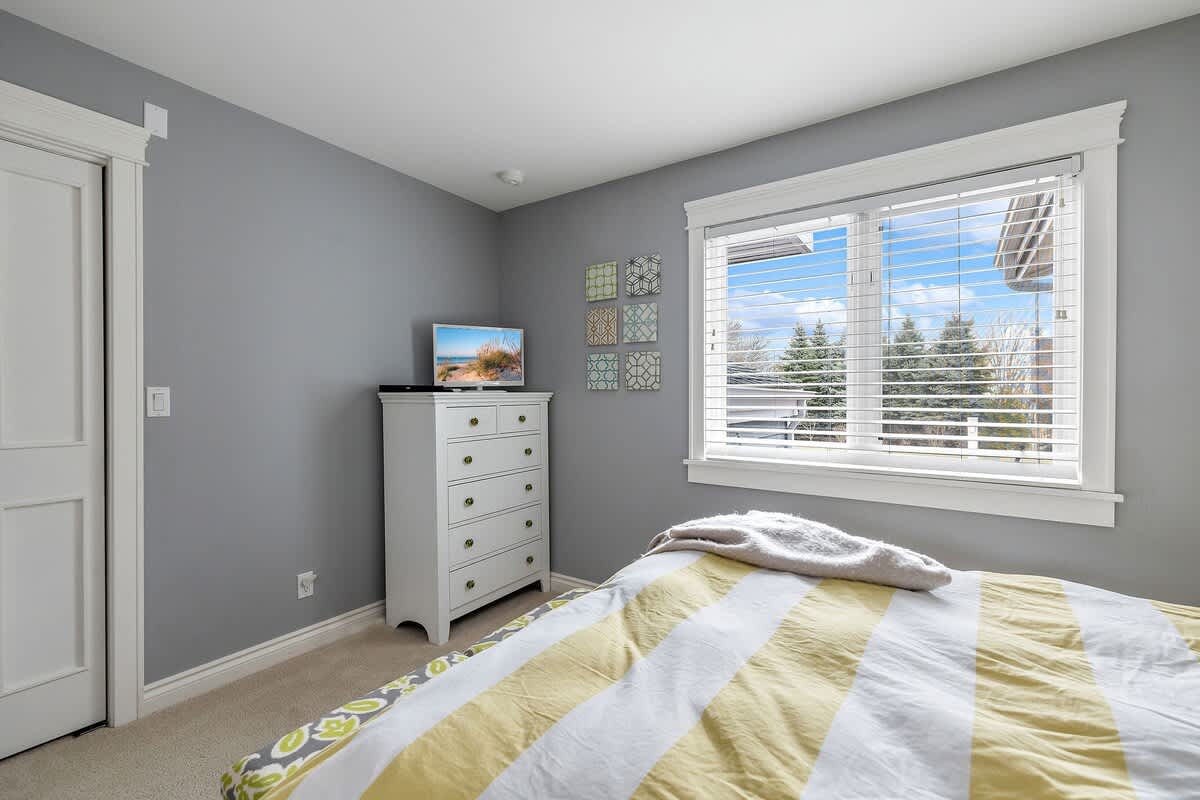 Bedroom 5 is on the lower level & has a queen-size bed.